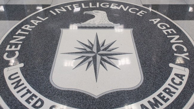 TO GO WITH AFP STORY by Dan De Luce, Iraq-war-10years-US-spy
(FILES) The Central Intelligence Agency (CIA) logo is displayed in the lobby of CIA Headquarters in Langley, Virginia, in this August 14, 2008 file photo. US spy agencies still live under the shadow of disastrous intelligence failures that paved the way for the Iraq war, and now face a crucial test as they track Iran's nuclear program. In the run-up to the invasion of Iraq 10 years ago, the CIA and other intelligence services confidently asserted that Saddam Hussein's regime had stockpiles of weapons of mass destruction. Their findings backed up the White House's strongly-held conviction that Saddam was a menace who had to be toppled by force. But it turned out the intelligence community was "dead wrong in almost all of its pre-war judgments about Iraq's weapons of mass destruction," according to an official inquiry, the Silberman-Robb report.     AFP PHOTO/SAUL LOEB/FILES