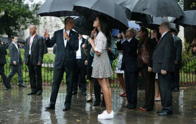 U.S. President Barack Obama, first lady Michelle Obama and their daughters Malia, 17, and Sasha, 14, take a walking tour of in the plaza of the 18th century Catedral de San Cristobal de la Habana in the historic Old Havana neighborhood March 20, 2016 in Havana, Cuba. Obama is the first sitting president to visit Cuba in nearly 90 years.