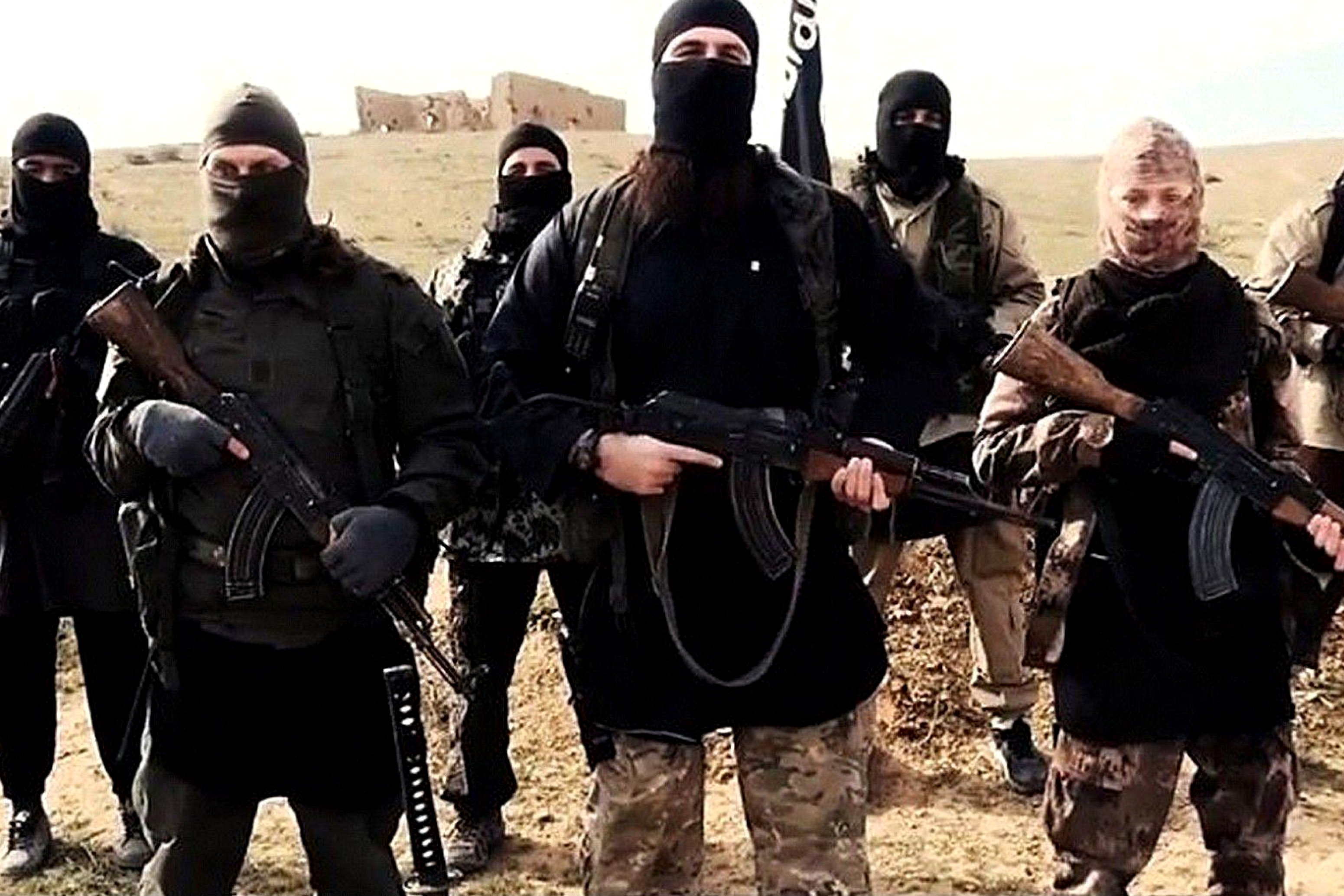 Mandatory Credit: Photo by REX USA (2642870a) Hayat Boumeddiene, far right Hayat Boumeddiene 'appears in Islamic State film' - 06 Feb 2015 The latest video released by French-speaking Islamic state (ISIS), fighters may be Hayat Boumeddiene, who is believed to have knowledge about the deadly January 9, 2015 attack on a Paris kosher grocery,The video, titled "Blow Up France 2," was released Tuesday and shows an ISIS fighter praising previous attackers in France and calling for new attacks. The video shows a woman standing next to the speaker, wearing camouflage clothing and holding a weapon. French authorities are investigating the possibility this woman could be Hayat Boumeddiene. Her husband, Amedy Coulibaly, killed four hostages January 9 at a kosher grocery in Paris, authorities said. He was killed by police in a rescue and the remaining hostages fled to safety.