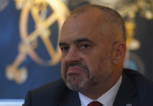 Albanian Prime Minister Edi Rama reacts during an interview with The Associated Press in Belgrade, Serbia, Monday, Nov. 10, 2014. Rama arrived on a two-day official visit to Serbia the first by an Albanian leader in 68 years. The prime ministers of Serbia and Albania pledged Monday to put their differences aside and focus on their mutual desire to join the European Union but the detente between the Balkan rivals didn't even last until the end of their joint press conference. (AP Photo/Darko Vojinovic)