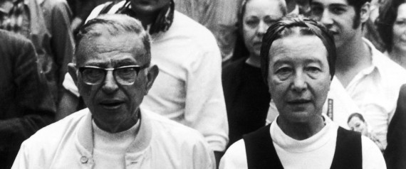 French writer and philosopher Jean-Paul Sartre, left, and his constant companion, Simone de Beauvoir, leave a police station in Paris, France, on June 26, 1970, released after being picked by police on a Paris street corner for distributing the left wing newspaper, "La Cause du Peuple" a publication of a Maoist movement called "La Gauche Proletarienne", which has been banned. Sartre has taken over as publisher. (AP Photo)